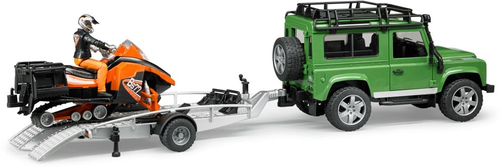 Внедорожник Land Rover Defender с прицепом, снегоходом и водителем  