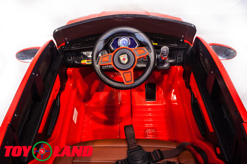 Электромобиль Porsche Macan красного цвета  