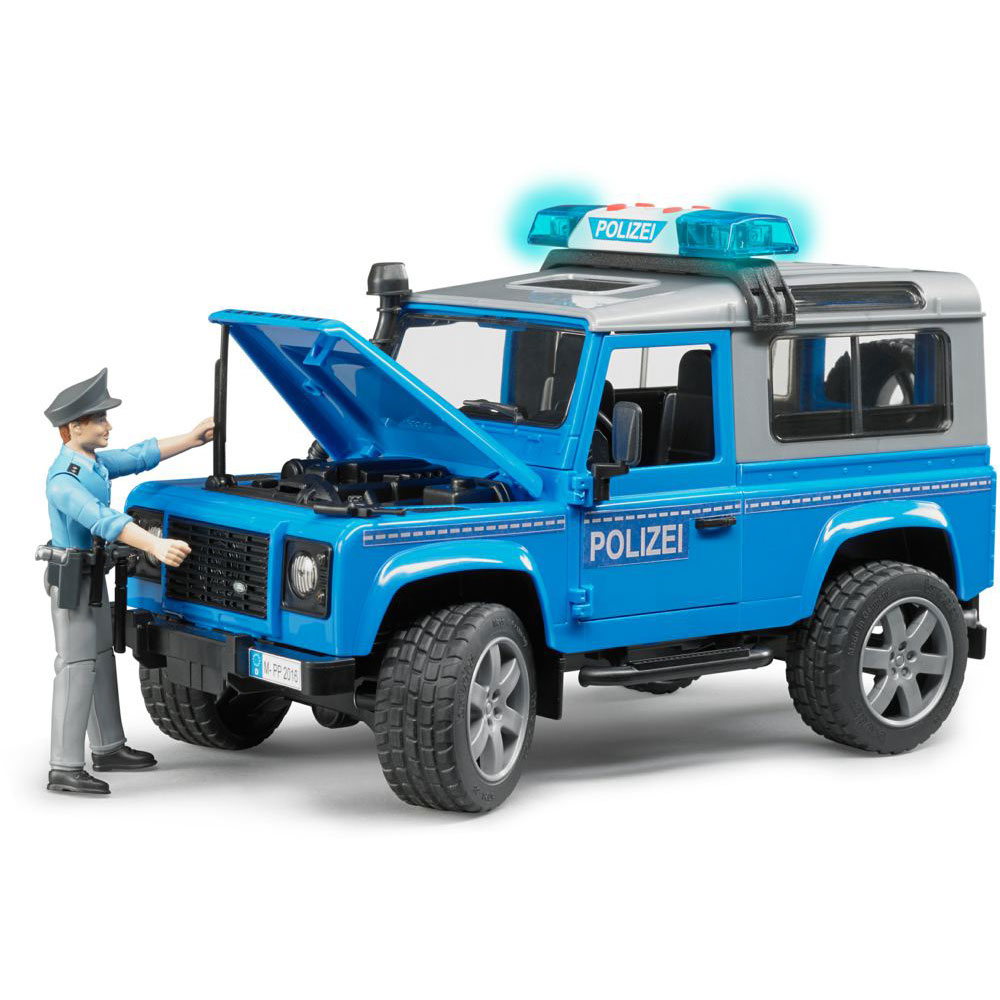 Полицейский внедорожник Bruder Land Rover Defender Station Wagon с фигуркой  