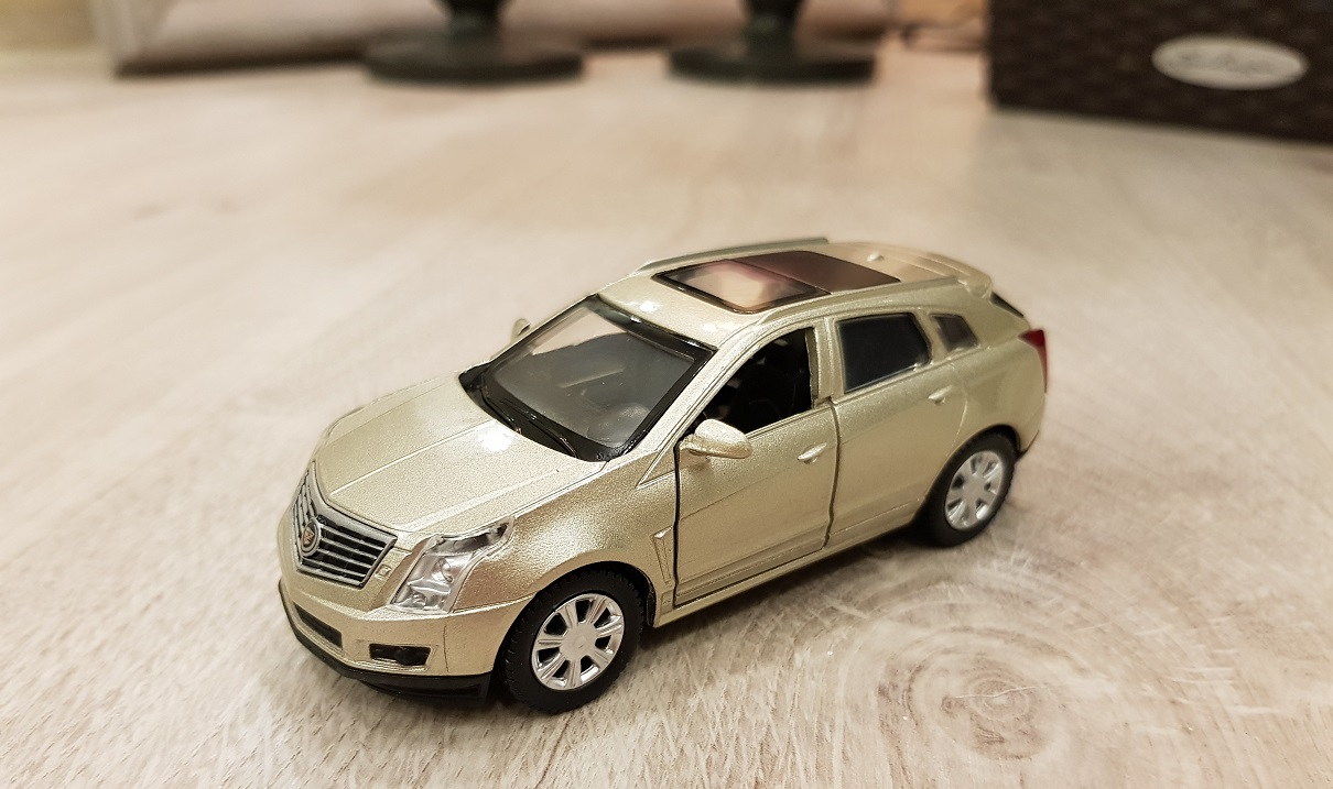 Машинка металлическая инерционная Cadillac SRX, открываются двери, 1:43  