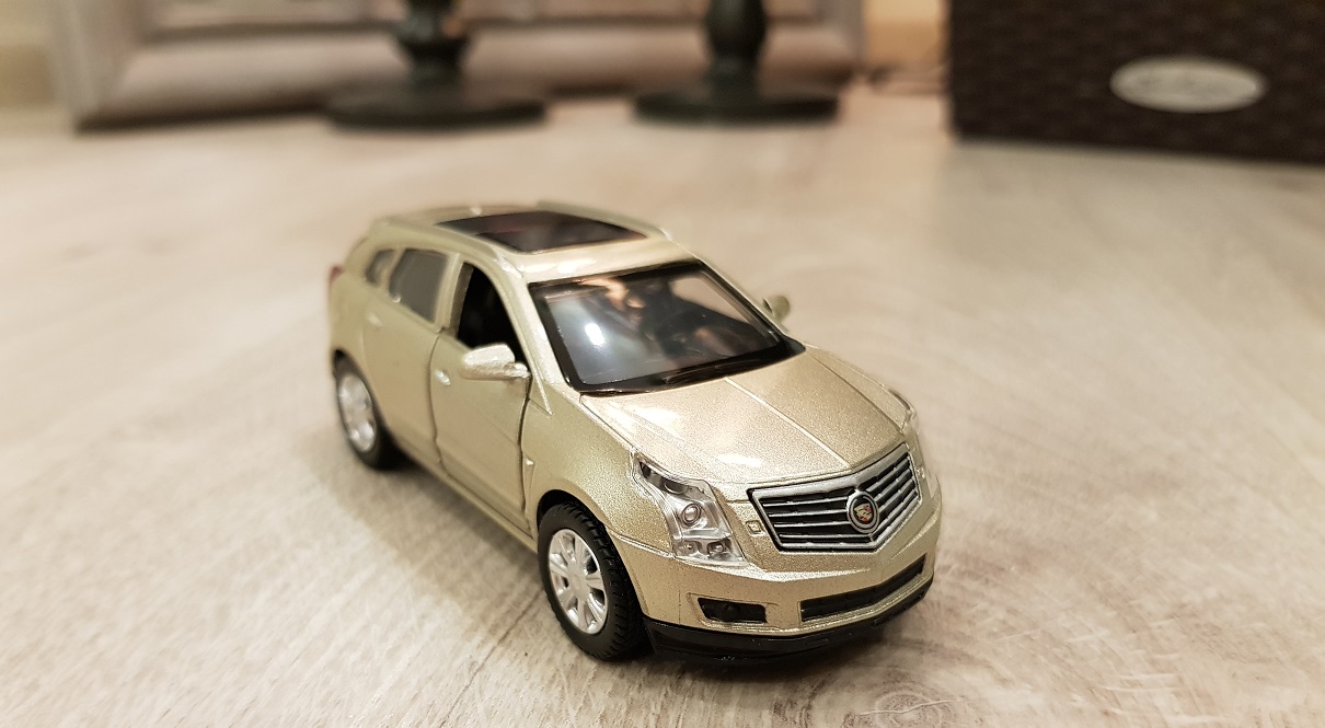 Машинка металлическая инерционная Cadillac SRX, открываются двери, 1:43  