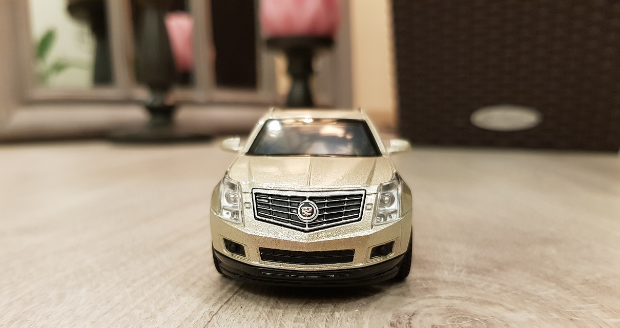 Машинка металлическая инерционная Cadillac SRX, открываются двери, 1:43  