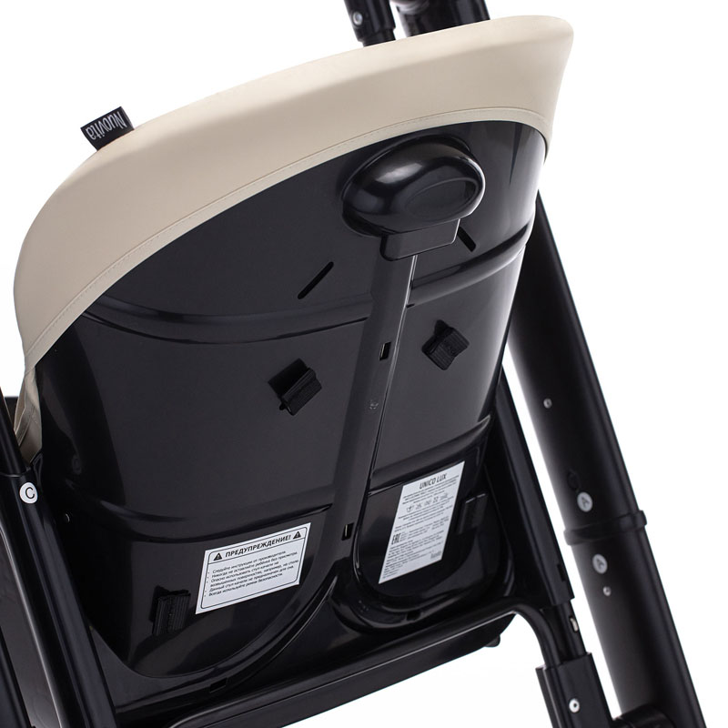 Стульчик для кормления с электронным устройством качения Nuovita Unico lux Nero, Latte, Nero/Латте, Черный  