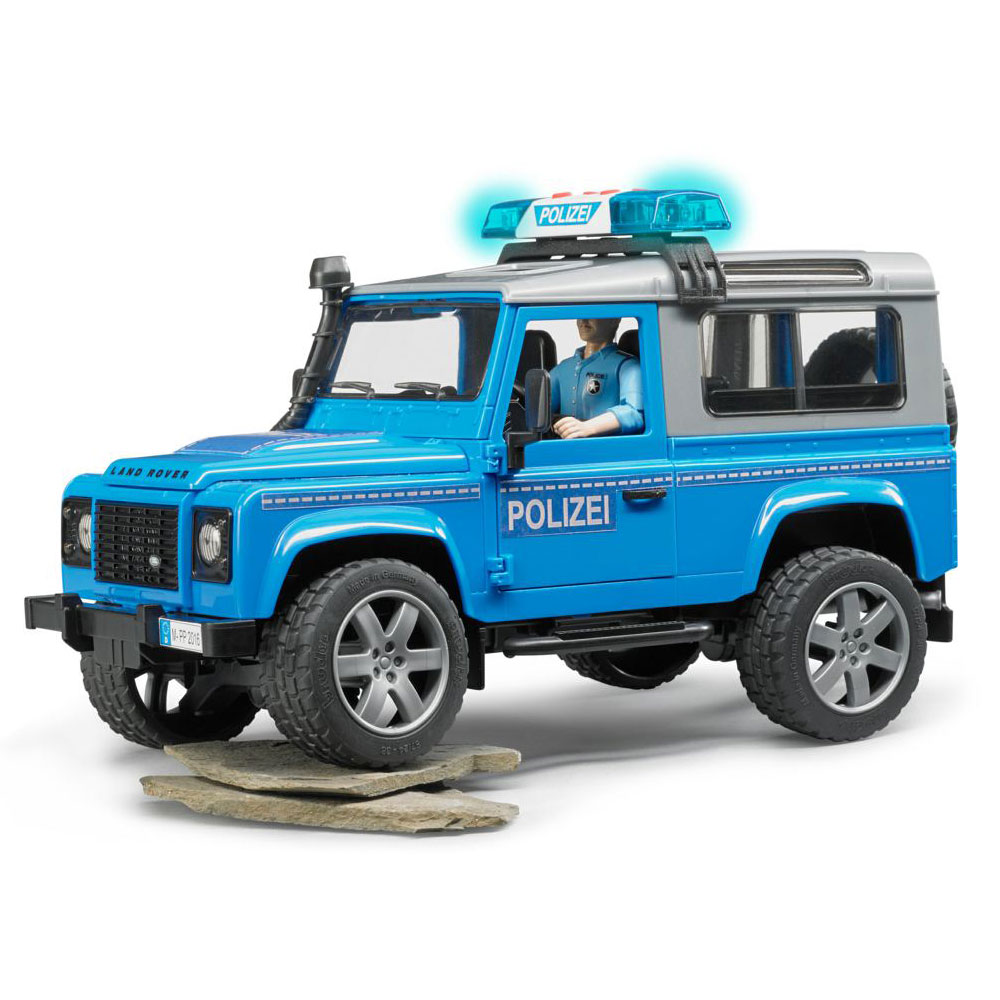 Полицейский внедорожник Bruder Land Rover Defender Station Wagon с фигуркой  