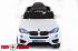 Электромобиль BMW X6 белого цвета   - миниатюра №4